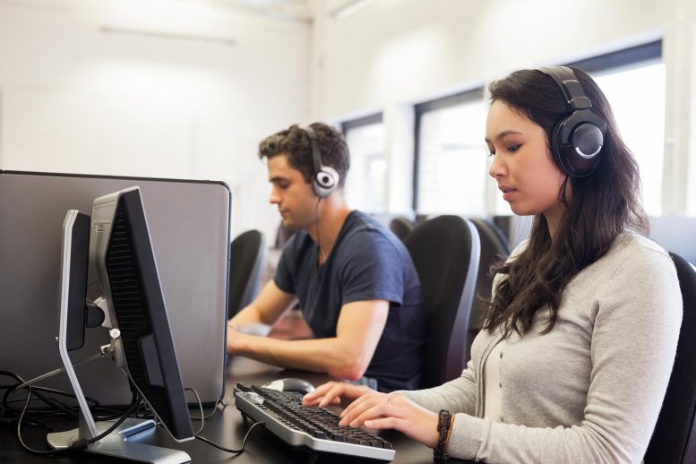 Student taking a computer-based IELTS mock exam
